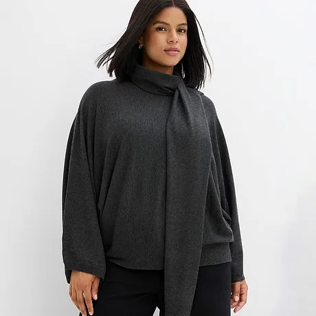 Pull gris foncé élégant à col montant.