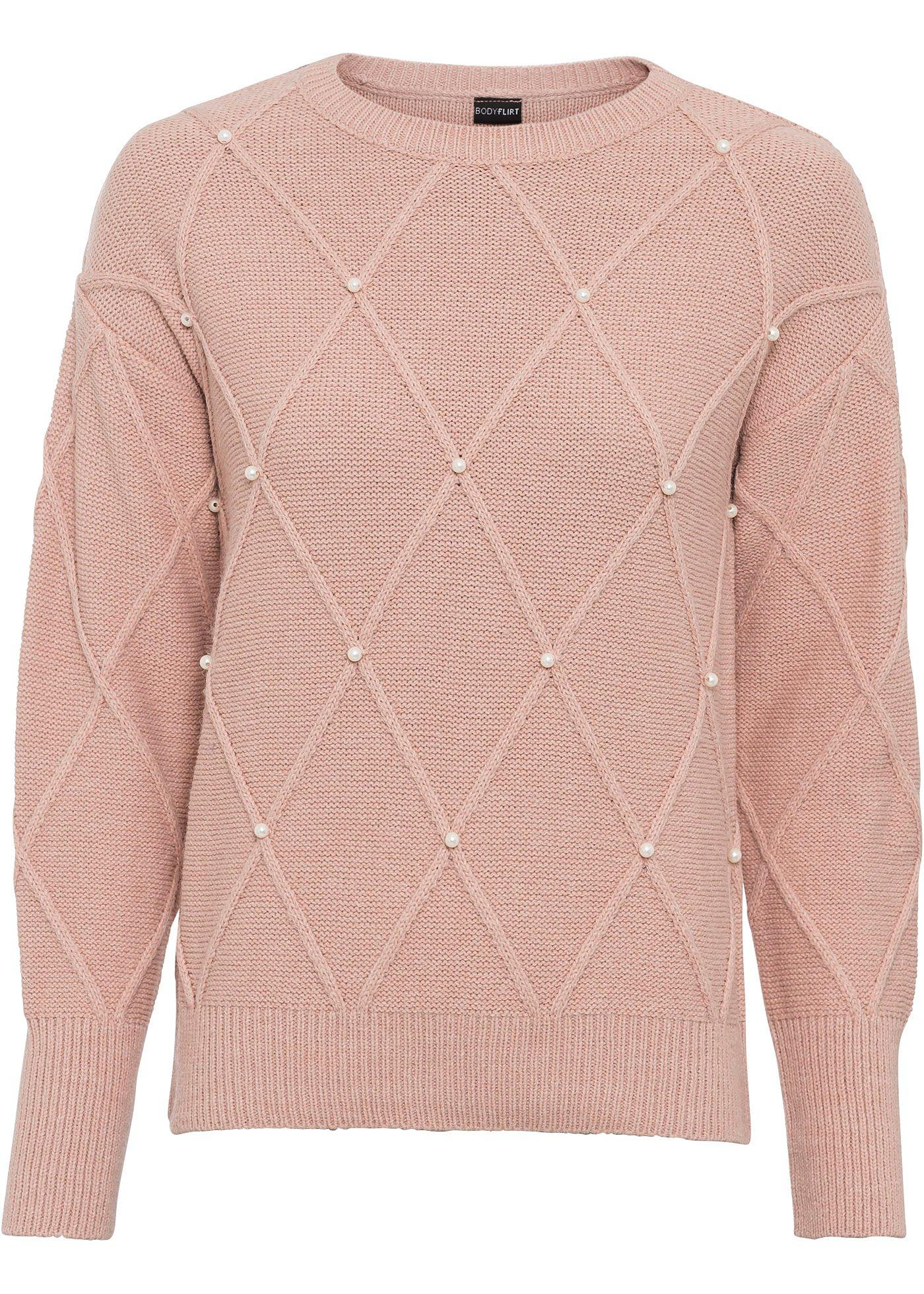 Pull avec éléments décoratifs