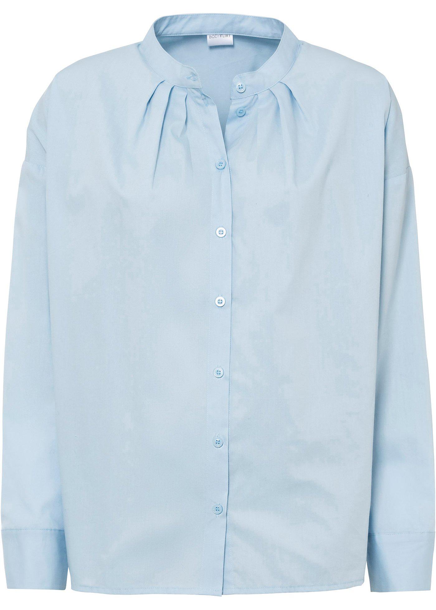 Jolie blouse oversized avec légères fronces