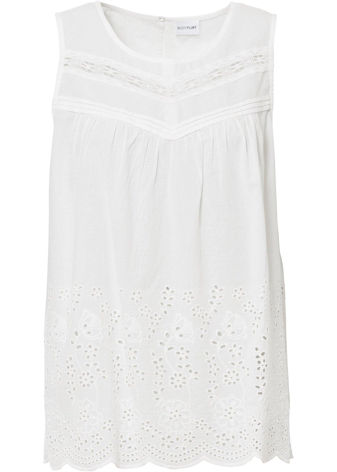 Top-blouse à broderie ajourée