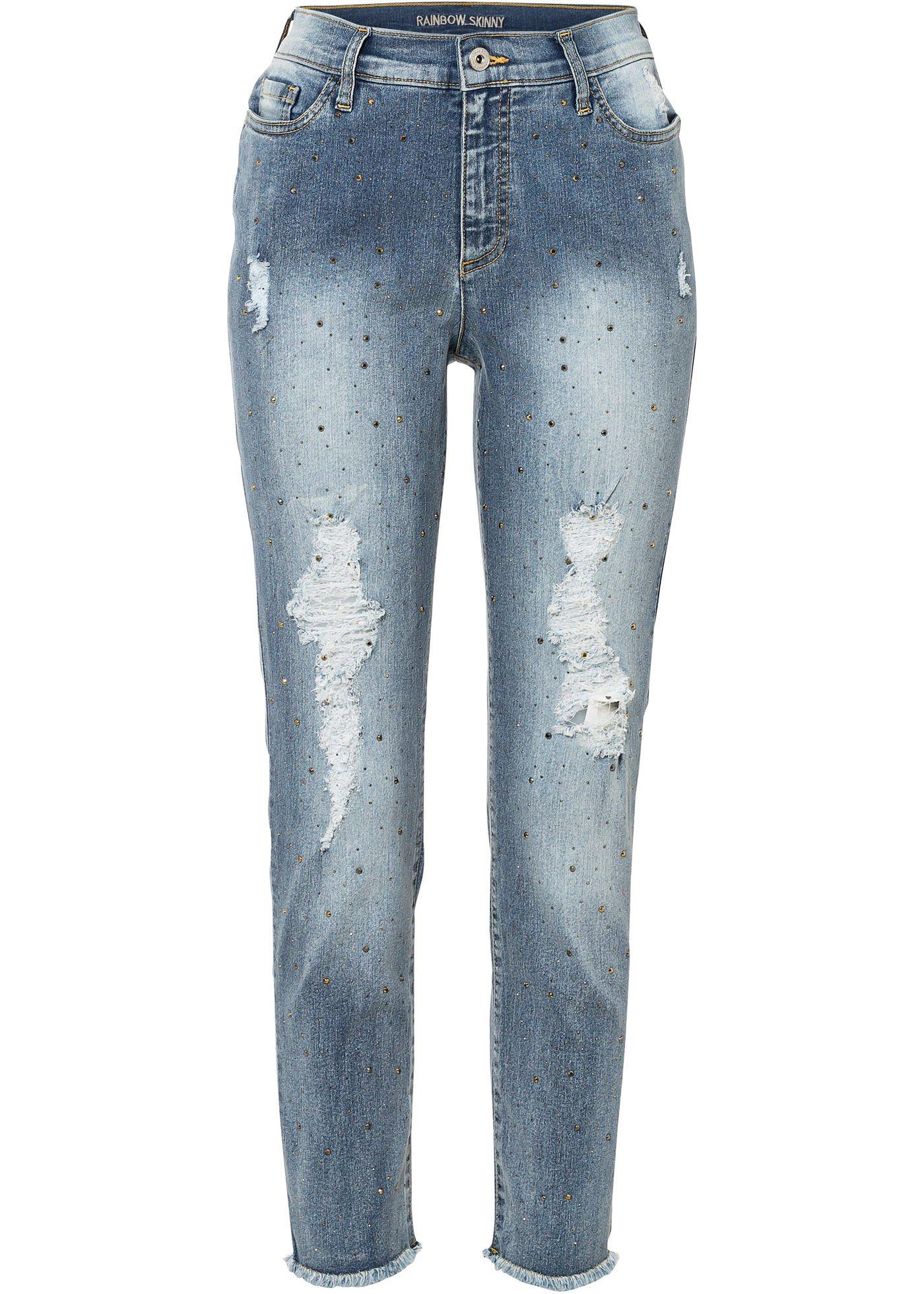 Jean Mom raccourci avec effets destroy et rivets