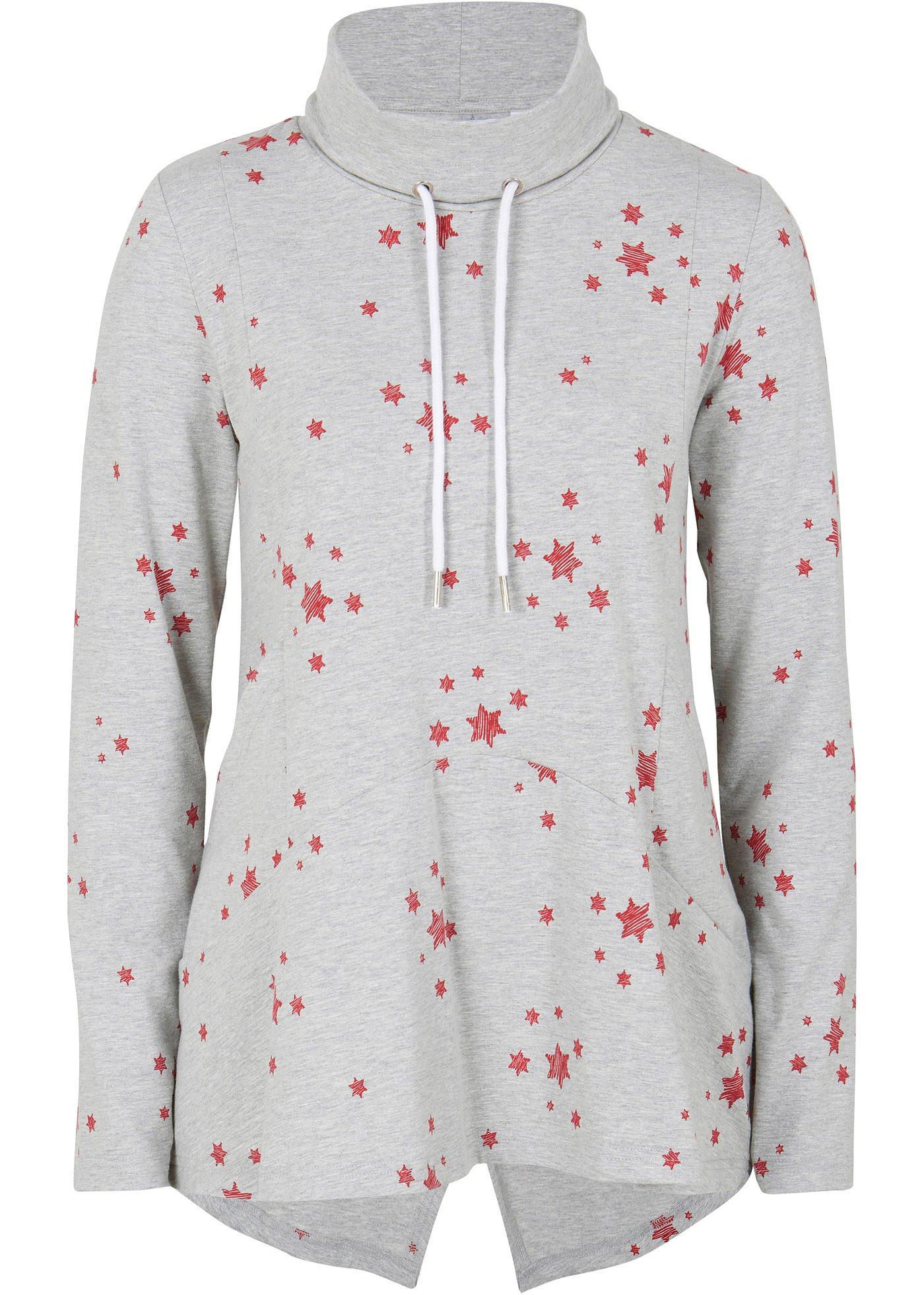 T-shirt style court-long avec col roulé et base volantée