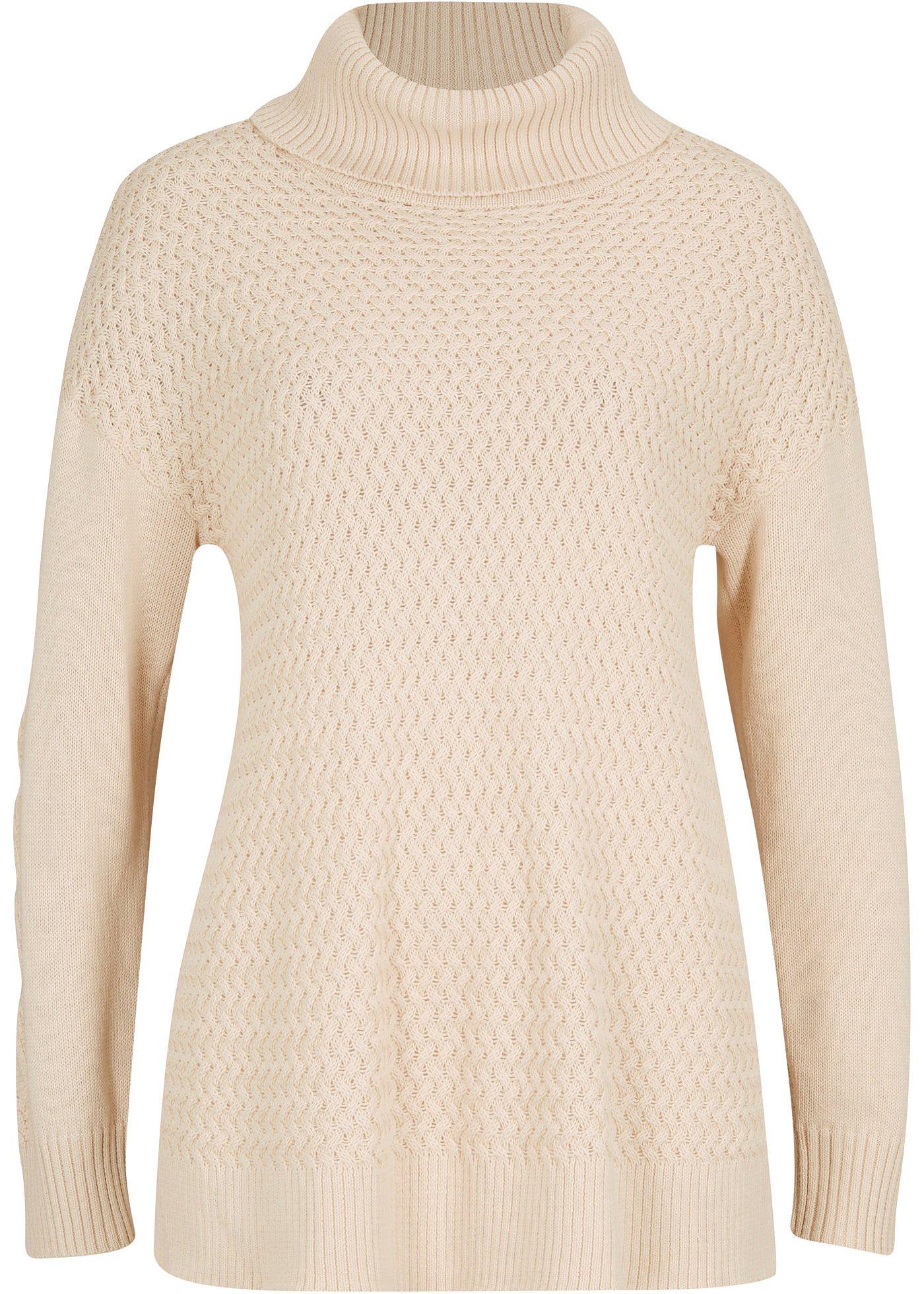 Pull col roulé avec fentes latérales