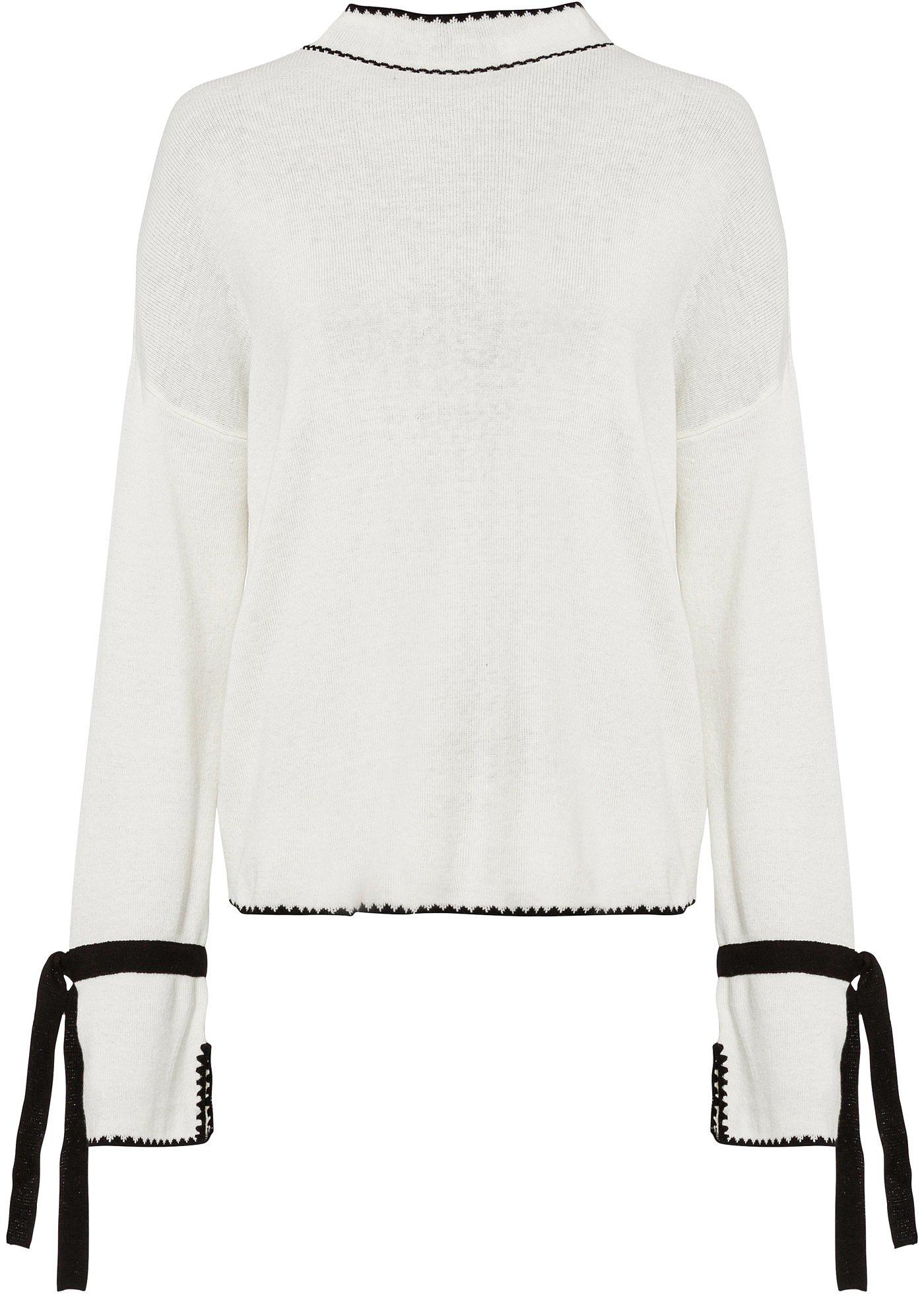 Pull en maille à volants