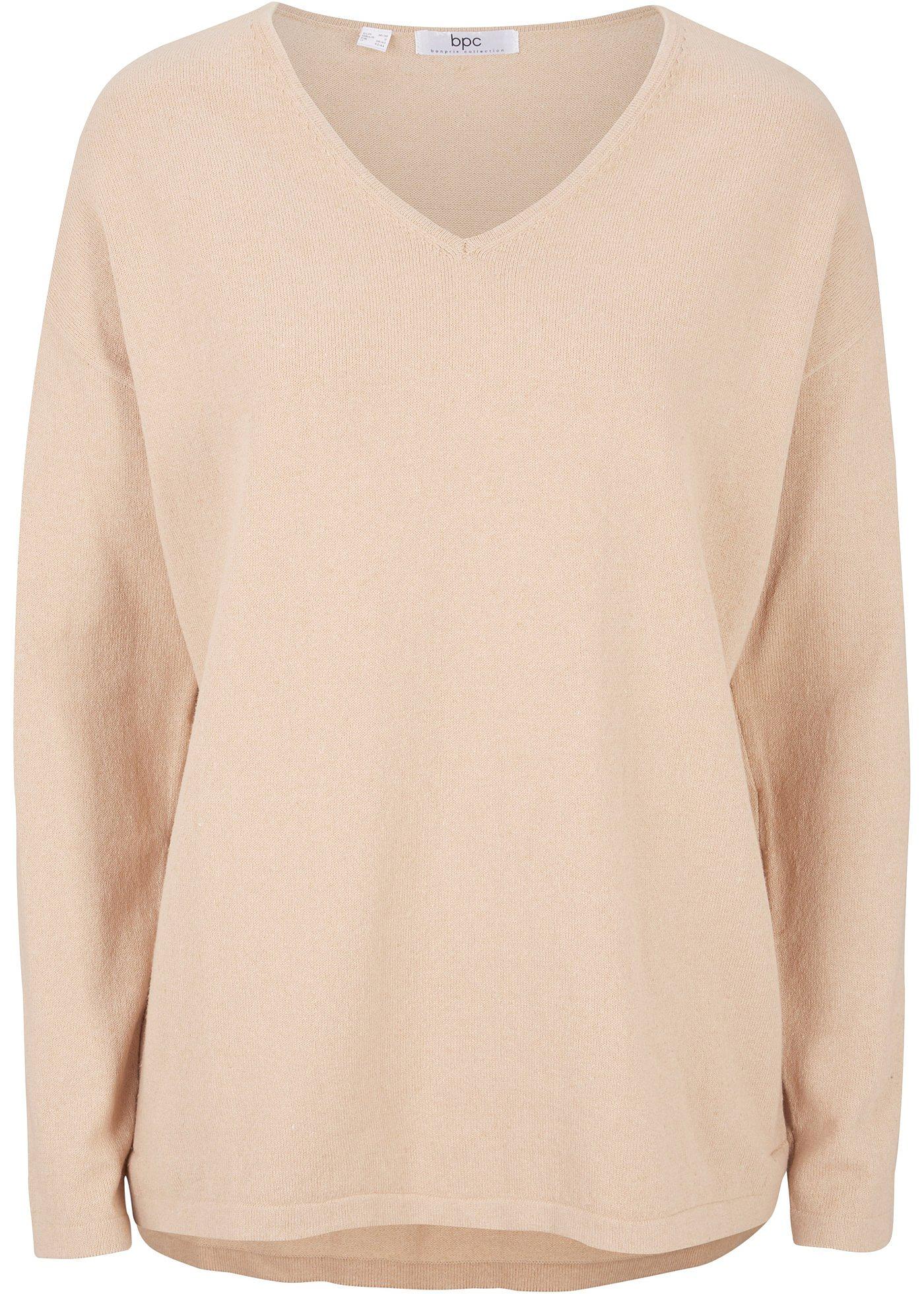 Pull court-long avec fente latérale