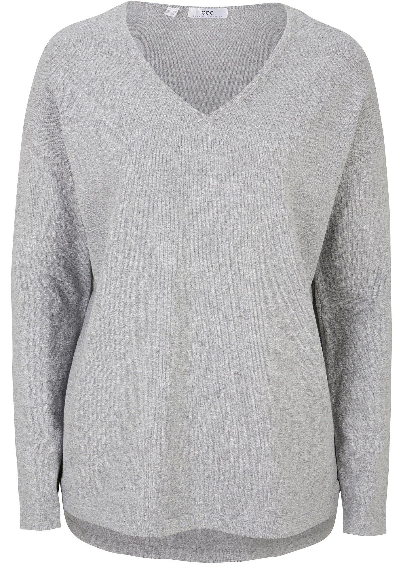 Pull court-long avec fente latérale