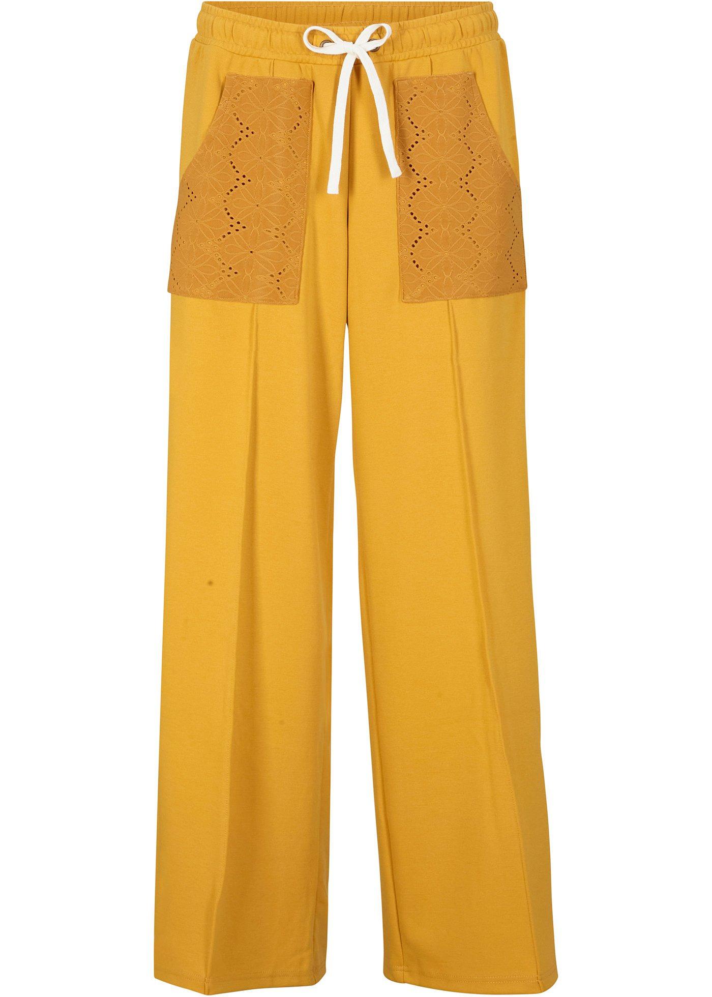 Pantalon palazzo en Punto di Roma avec poches décoratives