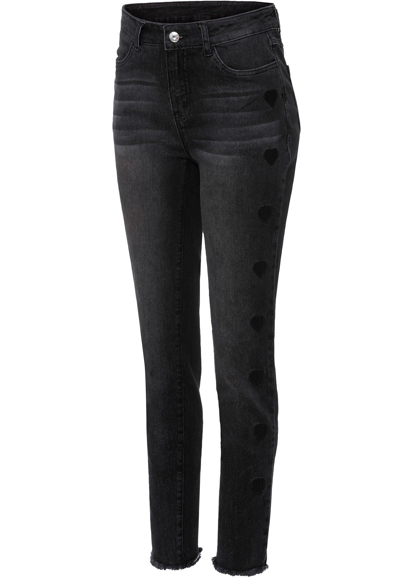 Jean extensible avec petits cœurs