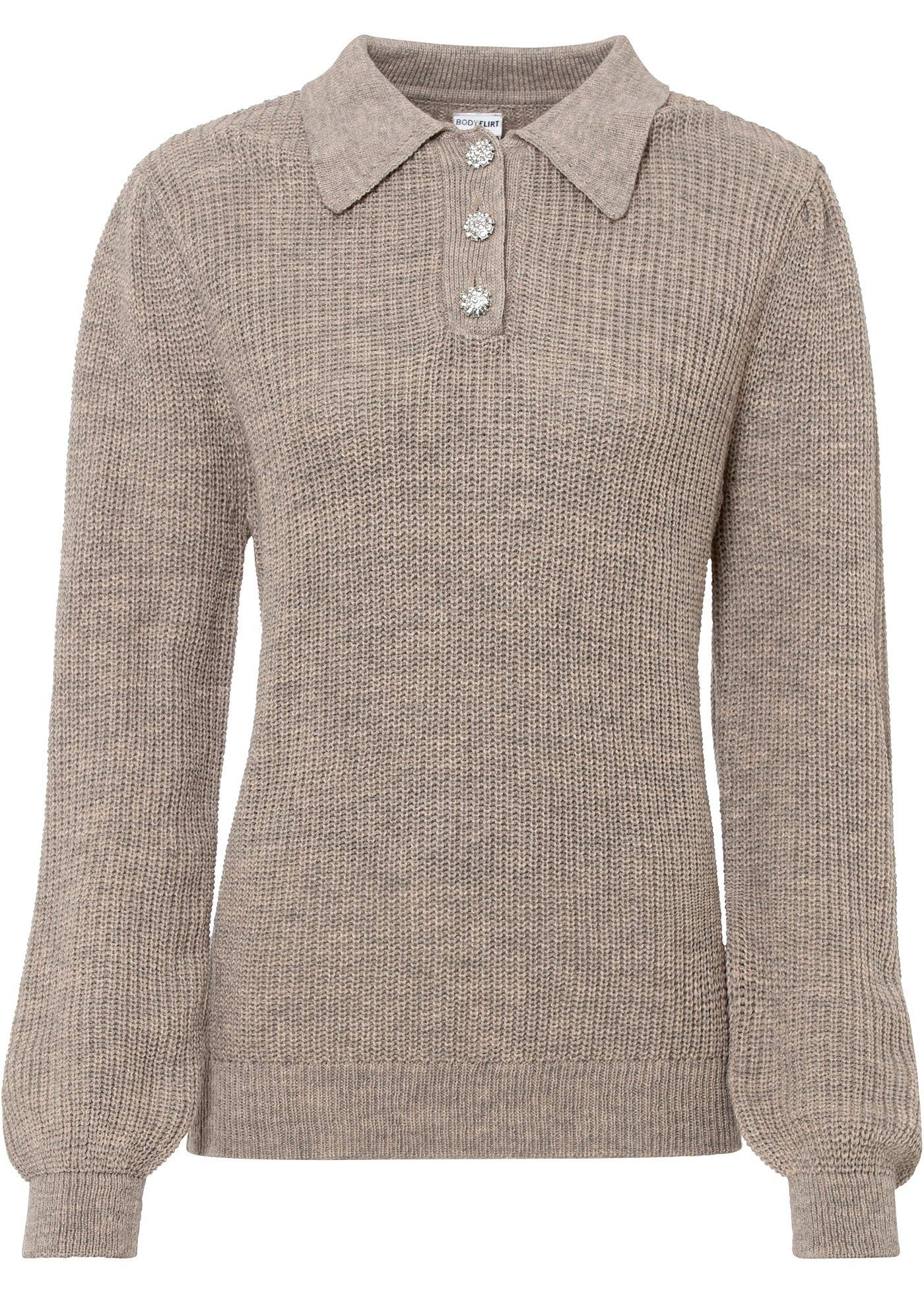 Pull avec boutons en strass