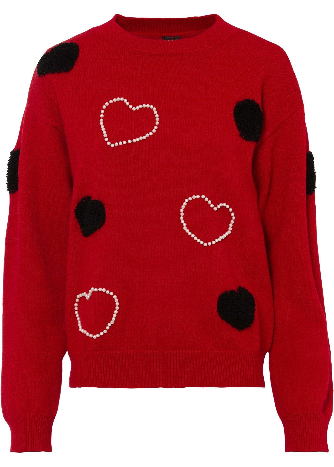 Pull avec éléments décoratifs appliqués