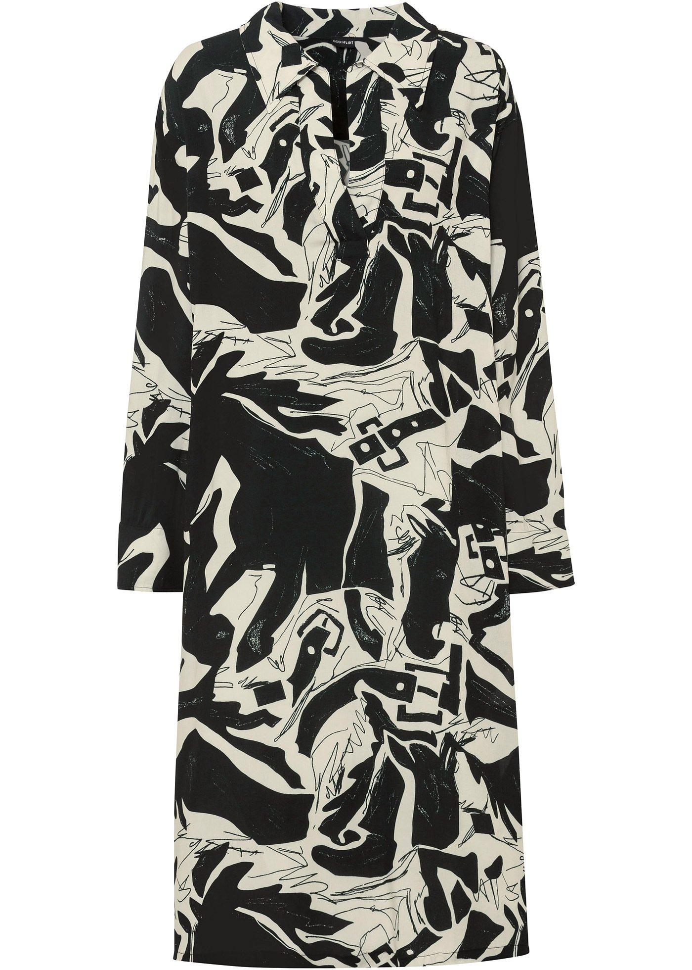 Robe oversize avec fentes latérales