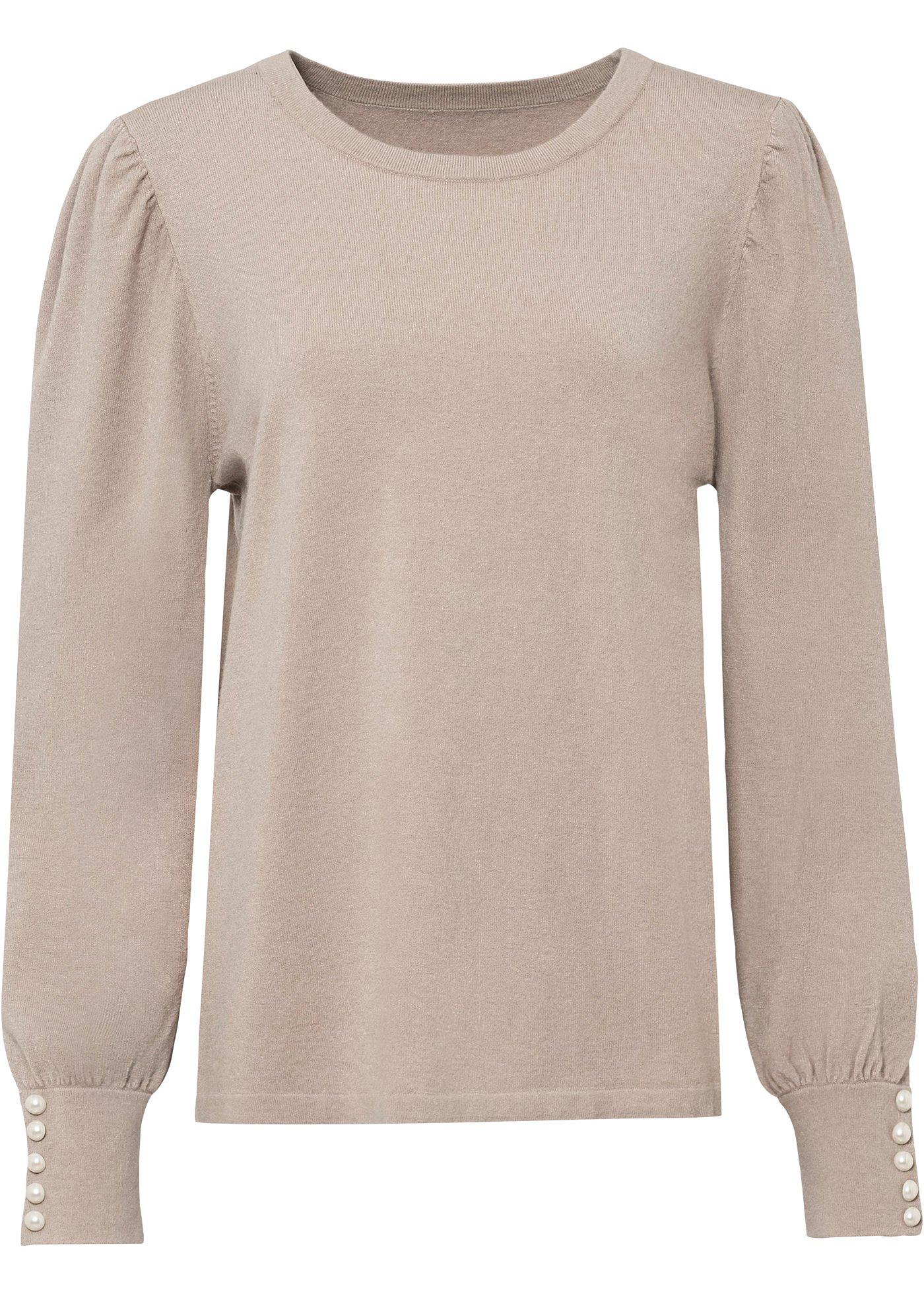 Pull avec éléments décoratifs