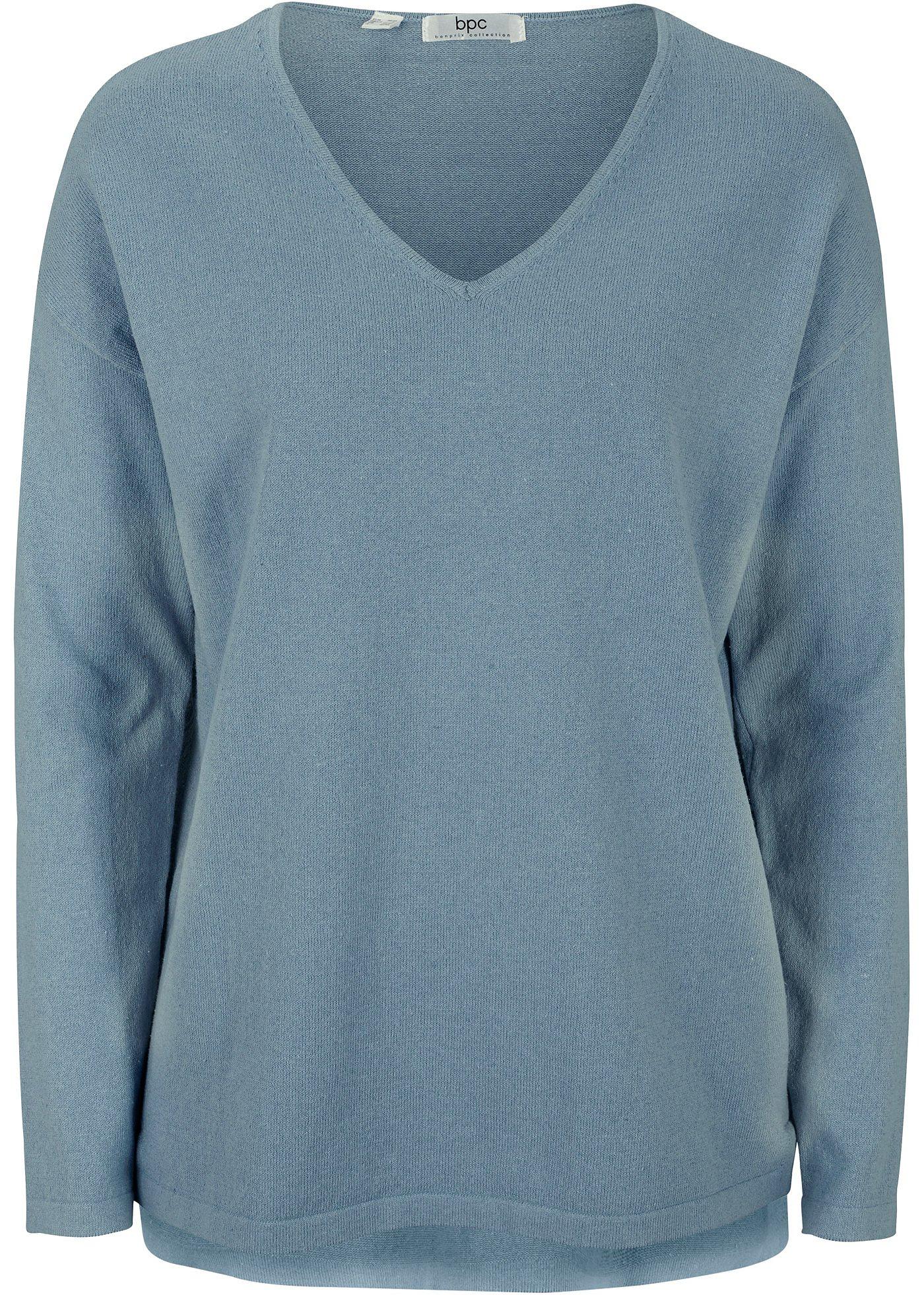 Pull court-long avec fente latérale