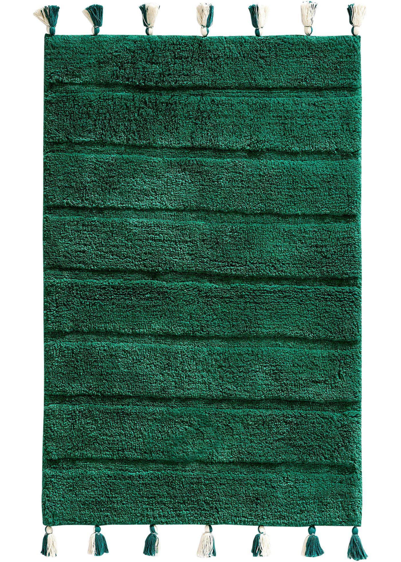 Tapis de salle de bain tufté avec houppes