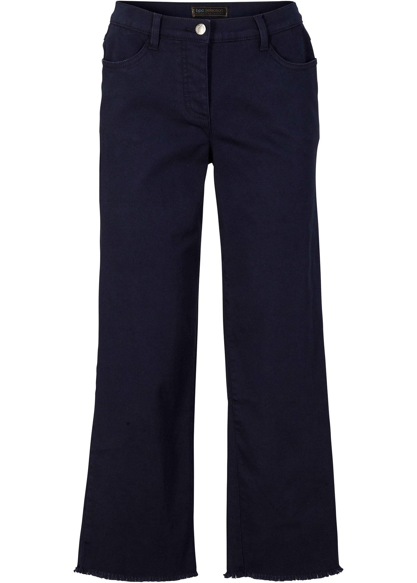 Pantalon extensible 7/8 avec base effilochée