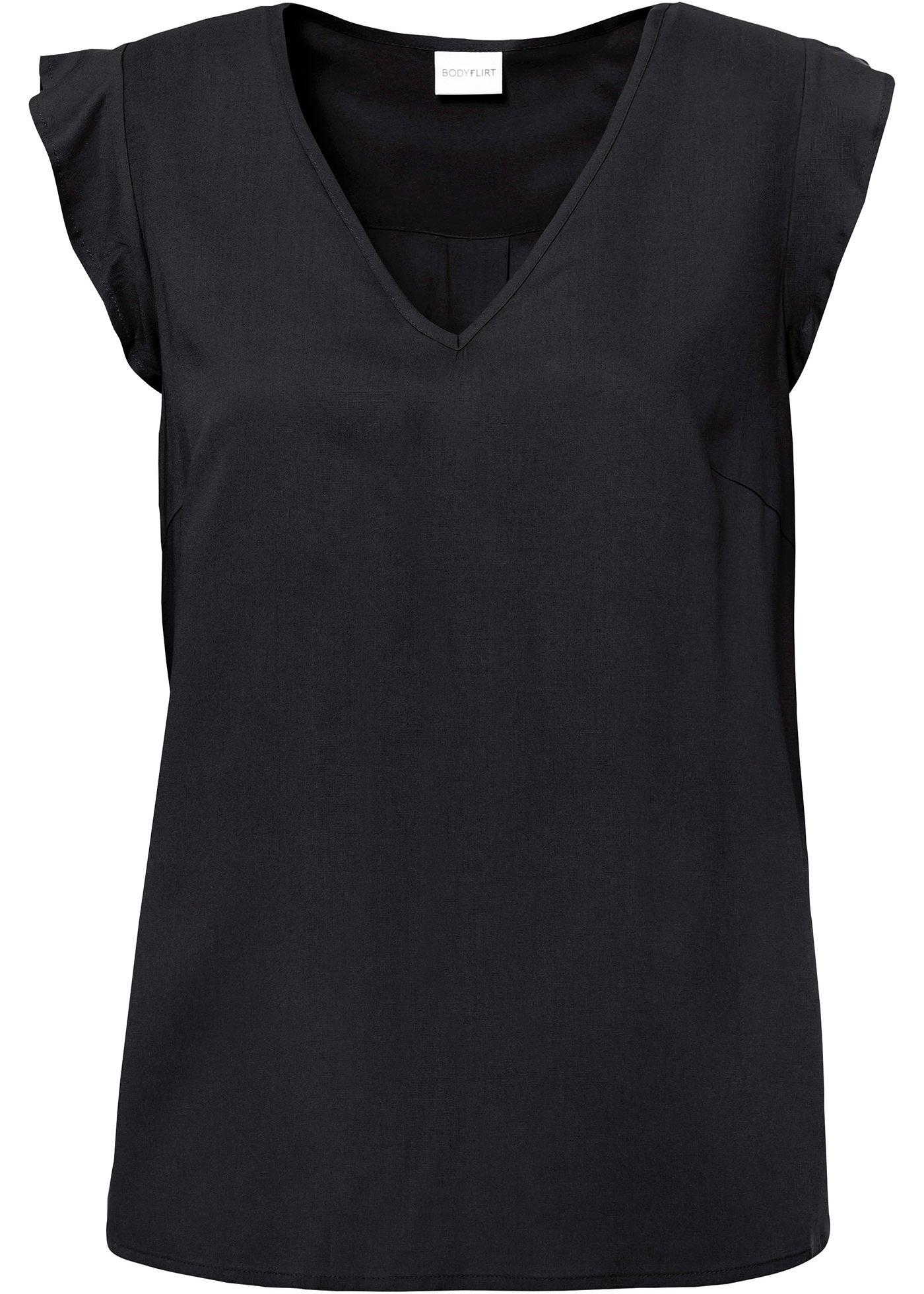 Blouse à manches papillon