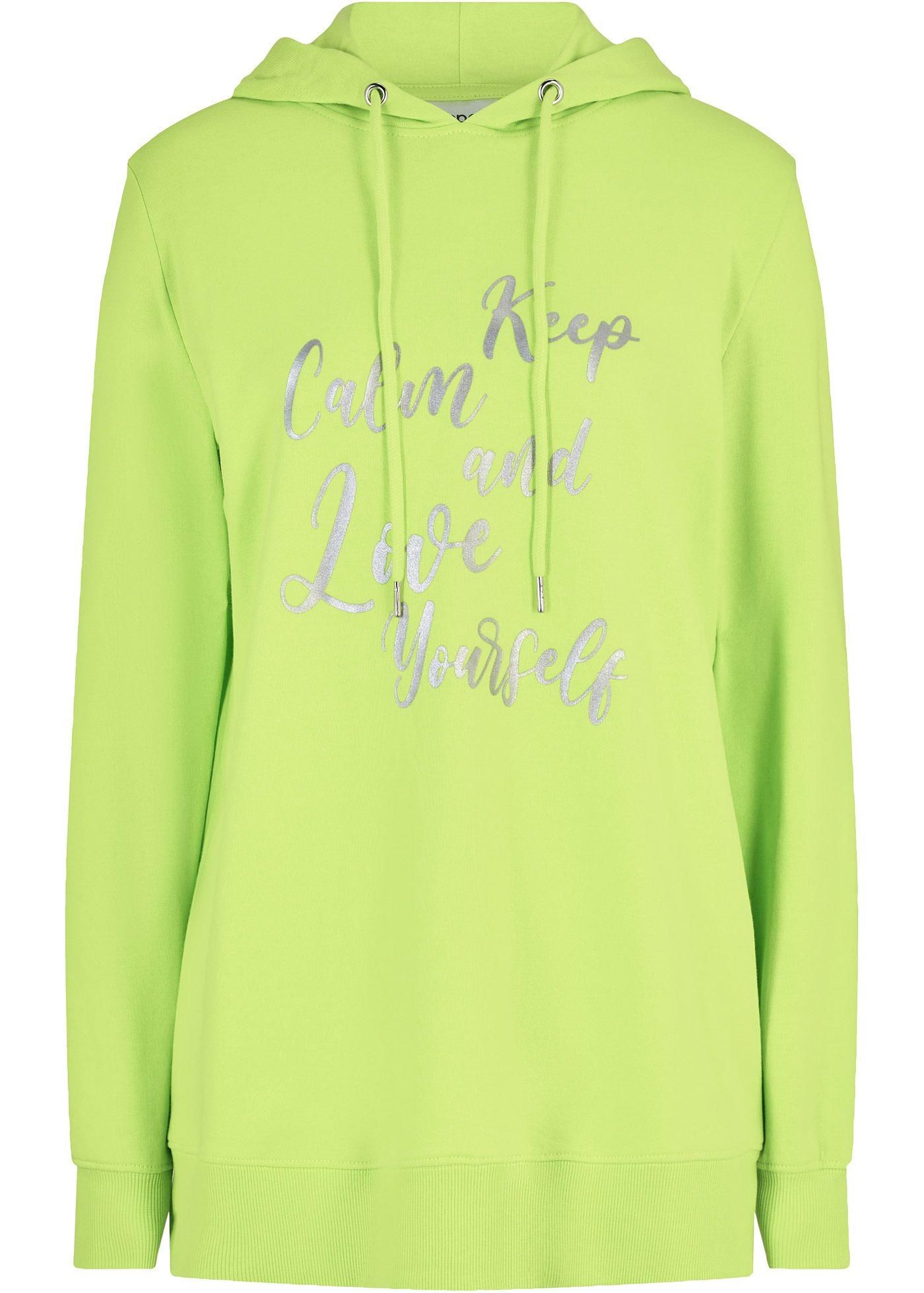 Sweat-shirt sport et féminin avec inscription métallisée, fentes latérales pour une plus grande libe