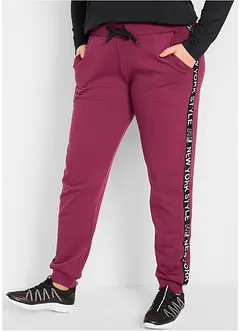 Pantalon en molleton avec lien à nouer et message imprimé, bonprix