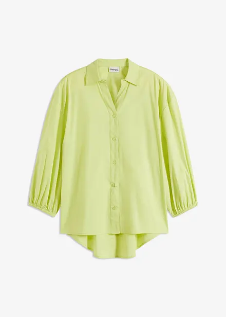 Chemisier court devant, long derrière, manches ballon