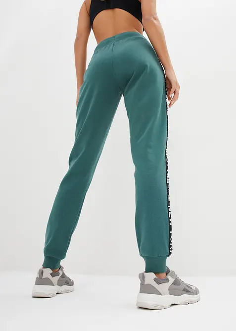 Pantalon de jogging avec finitions bord-côtes et imprimé, bonprix