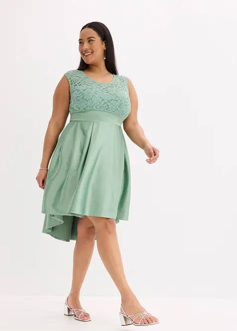 Robe courte devant, longue derrière en satin brillant avec dentelle, bonprix