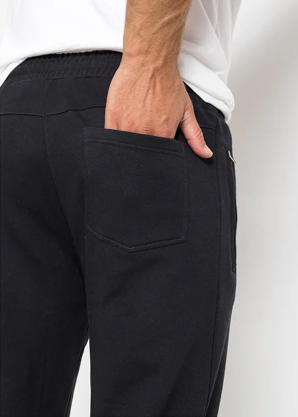 Pantalon de jogging à poches zippées pratiques, bonprix