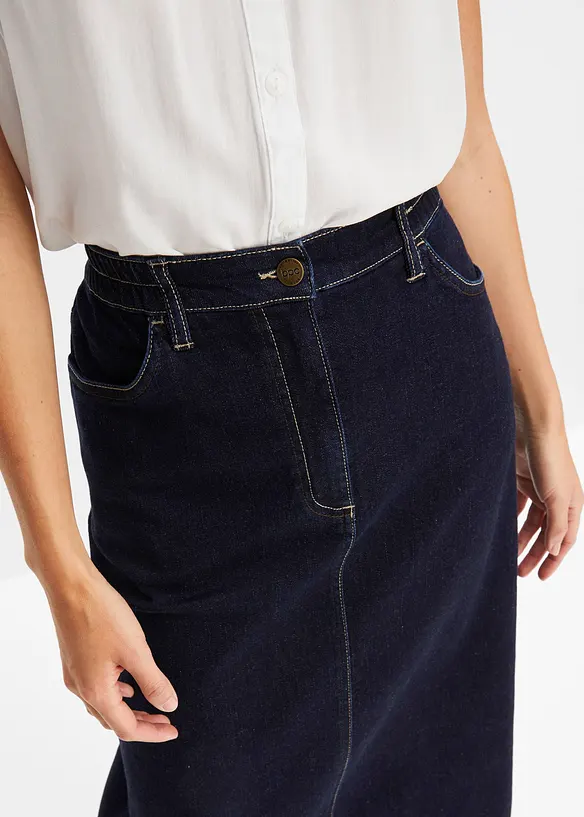 Jupe midi l&eacute;g&egrave;rement &eacute;vas&eacute;e en jean extensible avec taille &eacute;lastiqu&eacute;e, bonprix