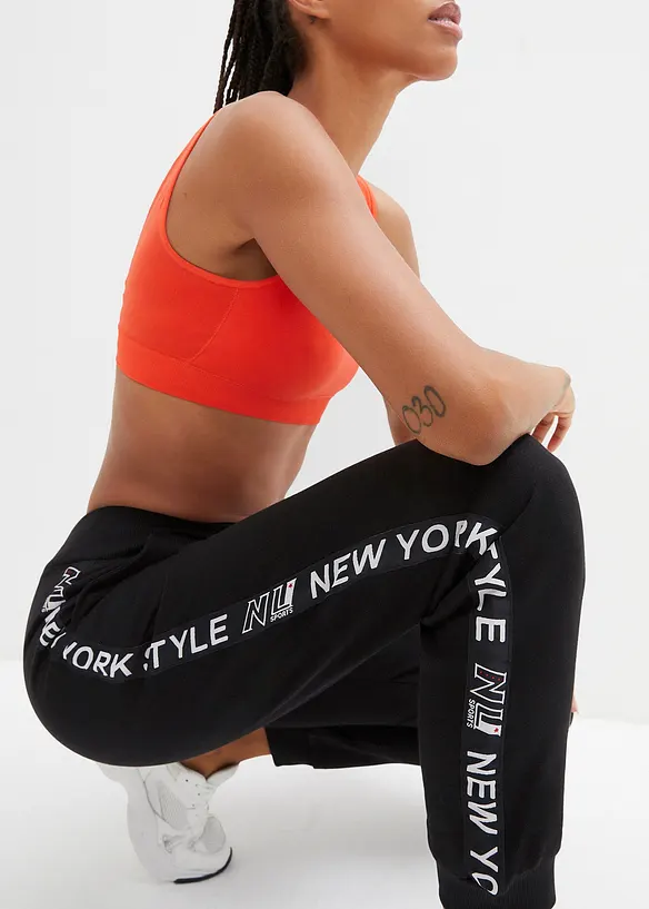 Pantalon de jogging avec finitions bord-côtes et imprimé, bonprix