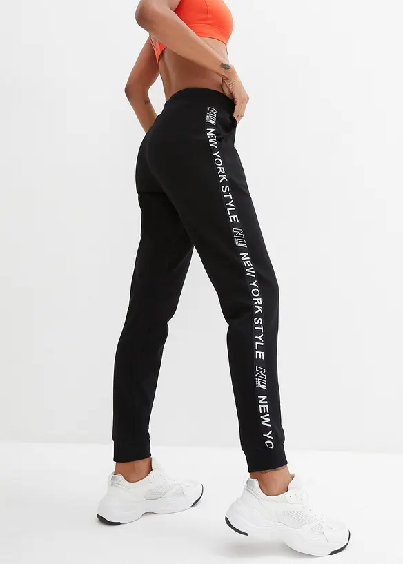 Pantalon de jogging avec finitions bord-côtes et imprimé, bonprix