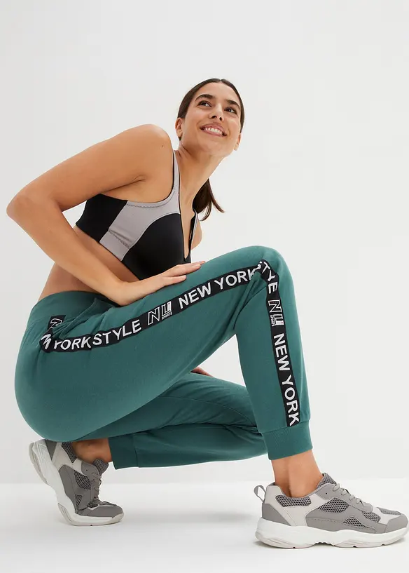 Pantalon de jogging avec finitions bord-côtes et imprimé, bonprix