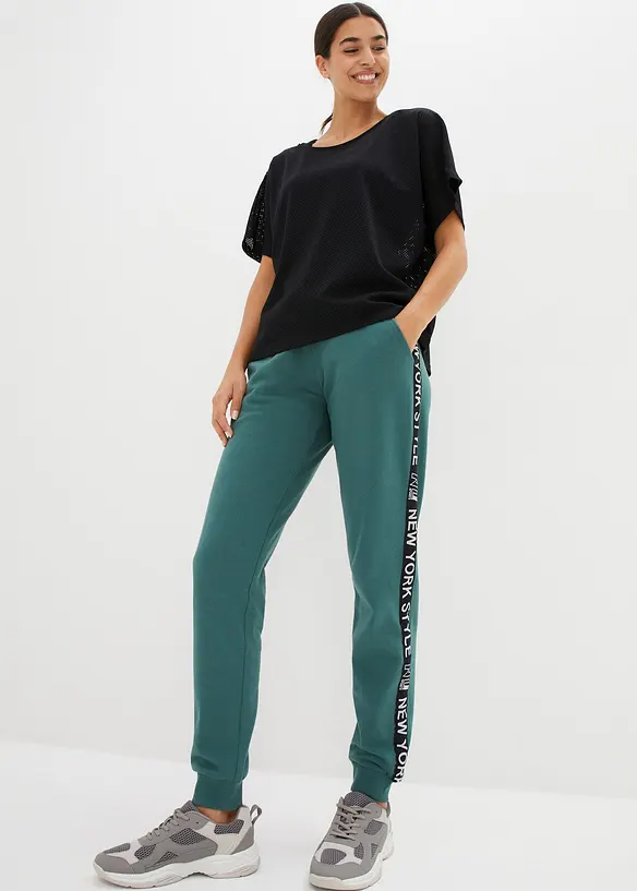 Pantalon de jogging avec finitions bord-côtes et imprimé, bonprix