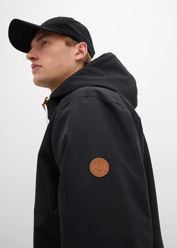 Veste technique déperlante à capuche et détails enduits, bonprix