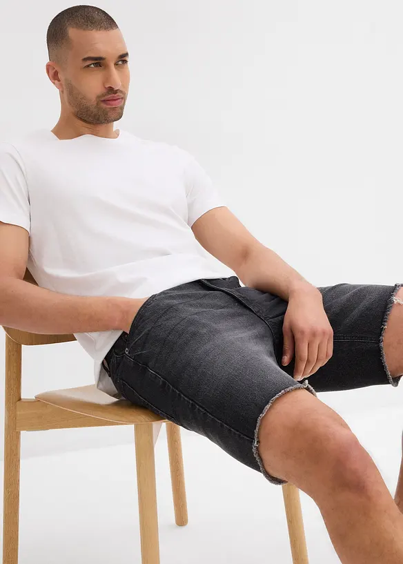 Bermuda en jean extensible &agrave; finitions effiloch&eacute;es, loose, bonprix