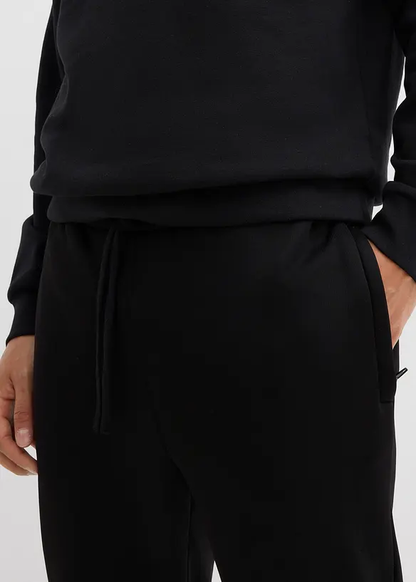 Pantalon de jogging chaud avec poches zippées pratiques, bonprix