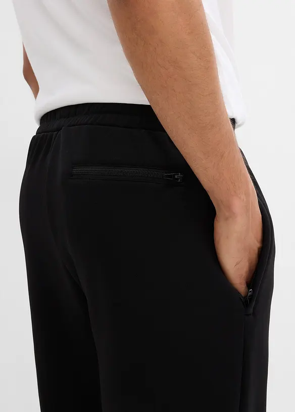 Pantalon de jogging chaud avec poches zippées pratiques, bonprix