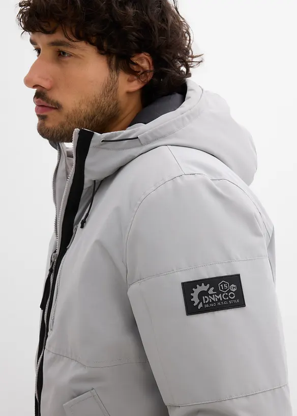 Blouson d’hiver à capuche et détails sportifs, bonprix