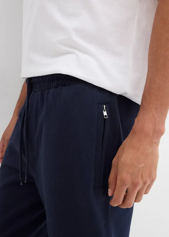 Pantalon de jogging à poches zippées pratiques, bonprix