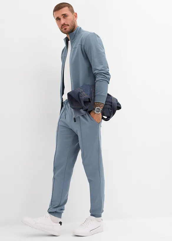 Pantalon sweat doux et élégant avec passepoil, bonprix