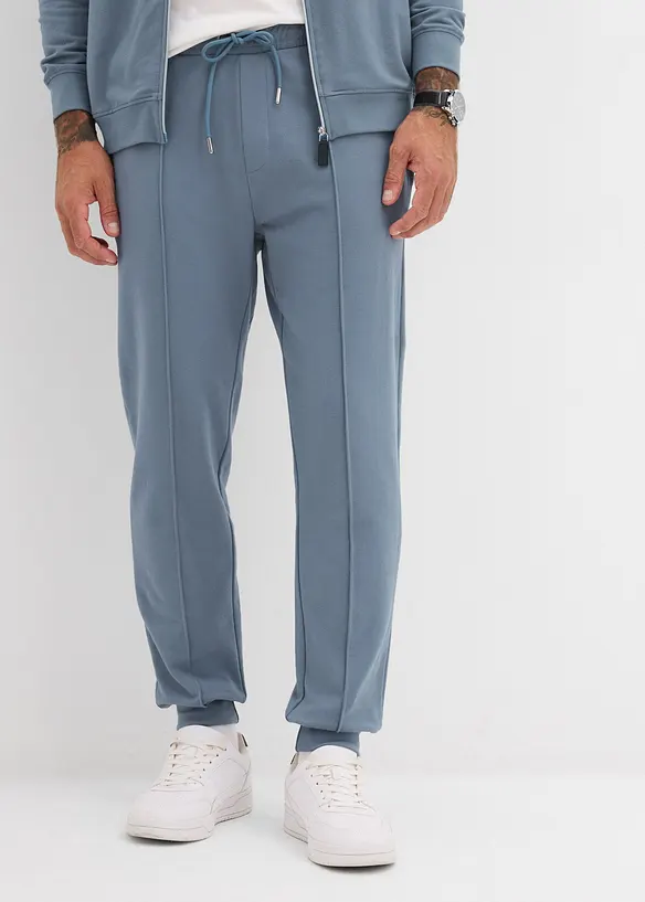 Pantalon sweat doux et élégant avec passepoil, bonprix